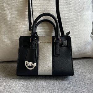 Michael Kors Dillon small metallic silver adjustable crossbody.